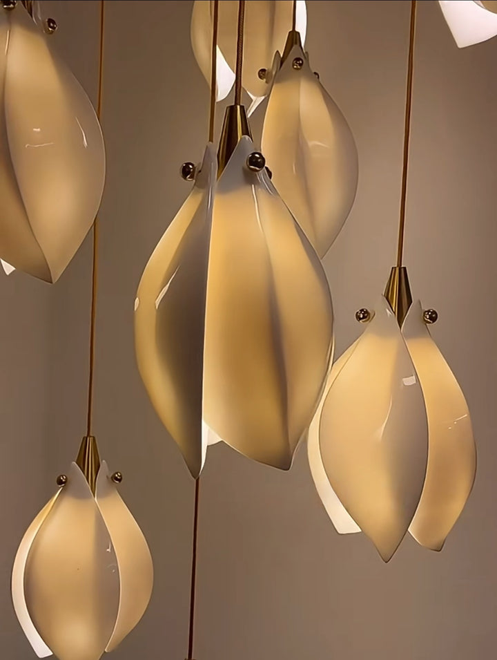 Close-up of hanging pendant lights with a neutral background